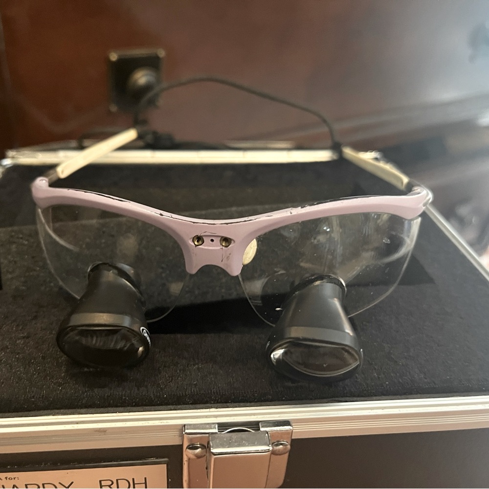 This sale is for a pair of Orascoptic Loupes. The frames show some wear